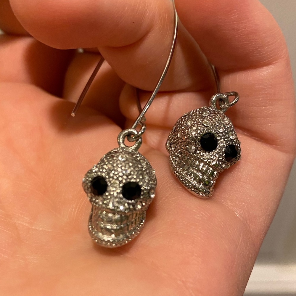 Hollow 3D silver skull earrings has matching ring if wanted as a set.